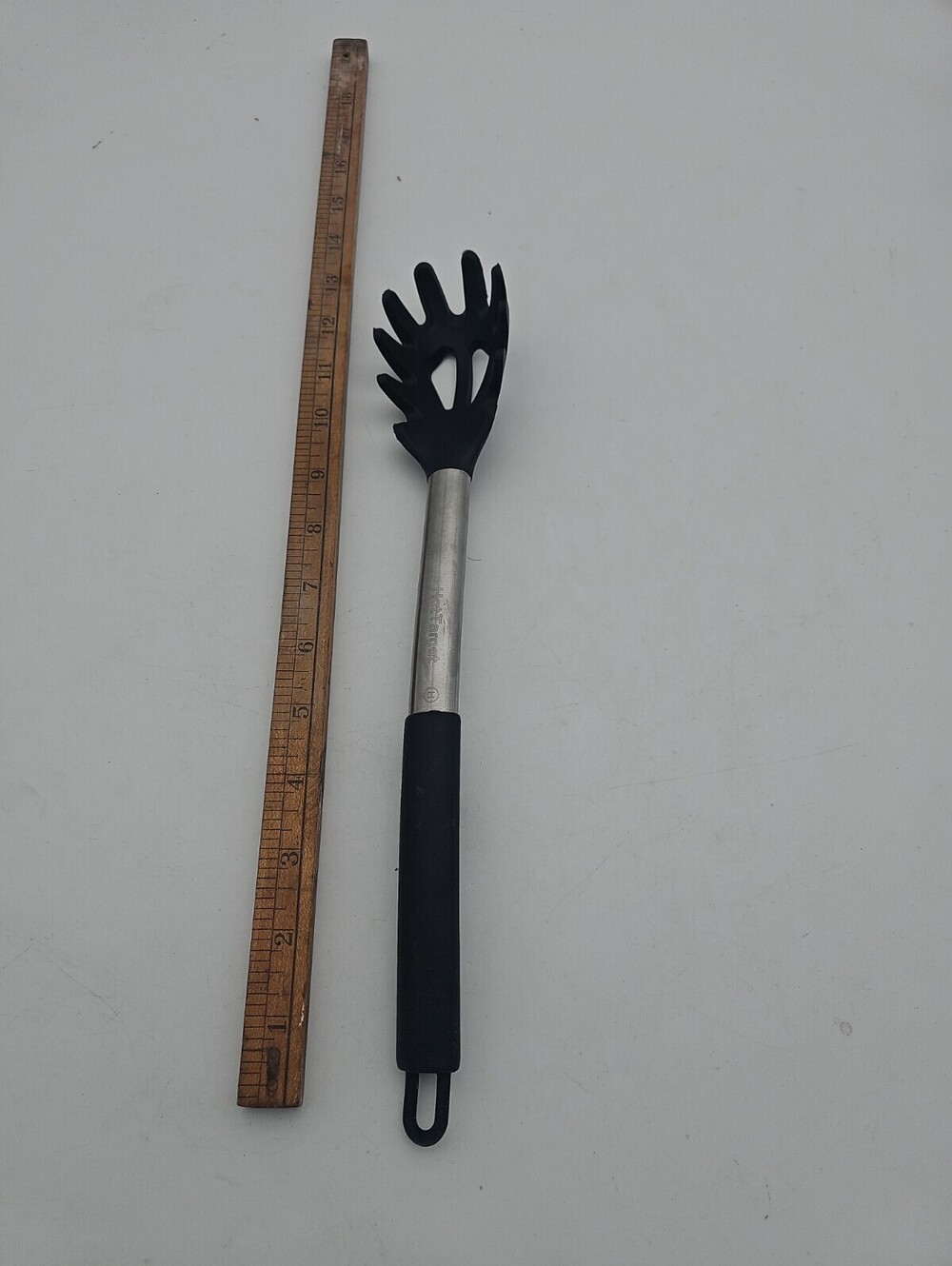 Hot Target silicone spaghetti server spoon with stainless steel handle. 12 Inch